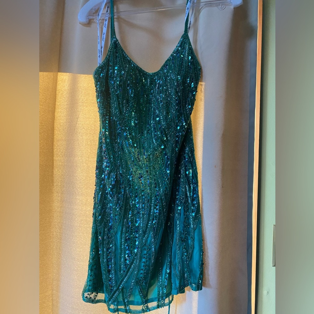Emerald green homecoming dress and size 7 shoes.